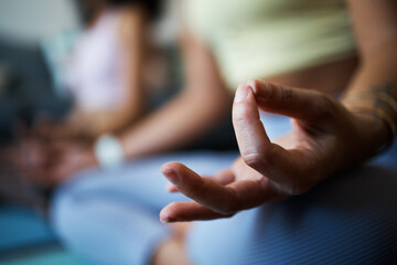 Woman, hands and zen for yoga, sitting and mediation for spiritual wellness, exercise and fitness....