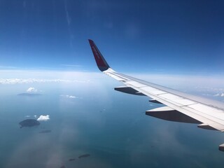view from an airplane window. Clouds. Wing