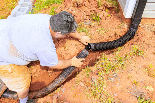 Drainage pipe connector downspout installation for flexible gutter extension with water draining down