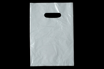 White plastic bag isolated on black background.