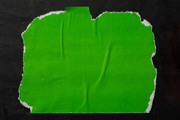 Scraps of green paper as a background.