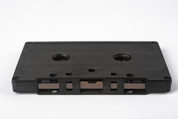 Vintage audio cassette on a white background close-up.