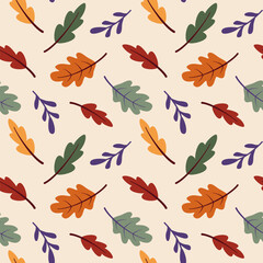 Pattern of orange, green and yellow autumn oak leaves in cartoon flat style on a beige background.