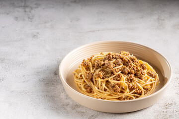 Spaghetti pasta with ground meat.