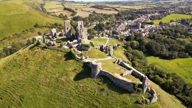 Descending over Corfe Castle ruins in Dorset