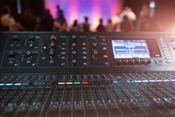 Live theater concert show sound video music control console with scene lights background. Sound...