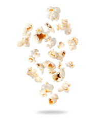 Fluffy popcorn scattered in the air closeup on a transparent background. Randomly falling popcorn - obrazy, fototapety, plakaty