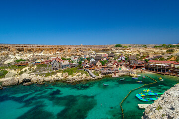 Popeye Village, also known as Sweethaven Village, is a set town in Malta that director Robert Altman had built for the 1979 film Popeye. - obrazy, fototapety, plakaty