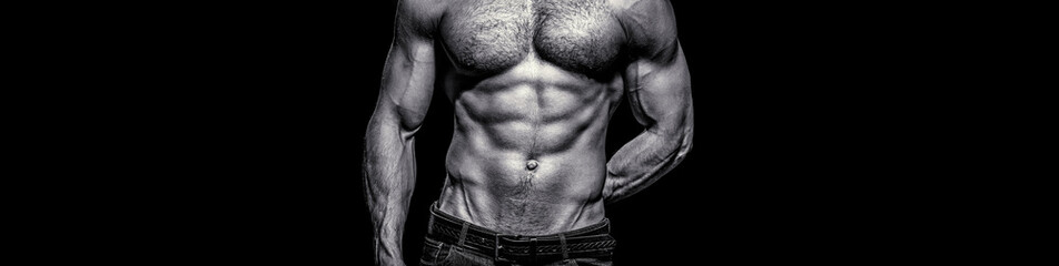 Muscular torso close up. Torso concept. Fashion portrait of strong brutal guy. Muscular sexy man...