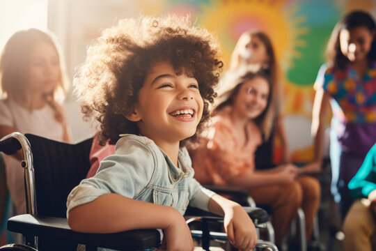 Cheerful little boy sitting in a wheelchair in kindergarten. Disabled child learning new skills with his typical peers. Education for special needs children.
