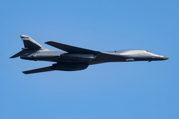 Strategic bomber plane at air base. Air force and army. Airport and airfield. Military aircraft. Aviation industry.