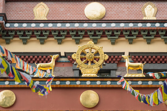 fragment of the facade of a Buddhist datsan Gunzechoinei building with traditional elements