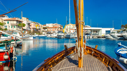 porto di stintino. view at the boats in Stintino marina in Sardinia, Italy - obrazy, fototapety, plakaty