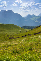 Obraz premium A view of the Dolomites and the countryside into Val di Fassa - Timelapse