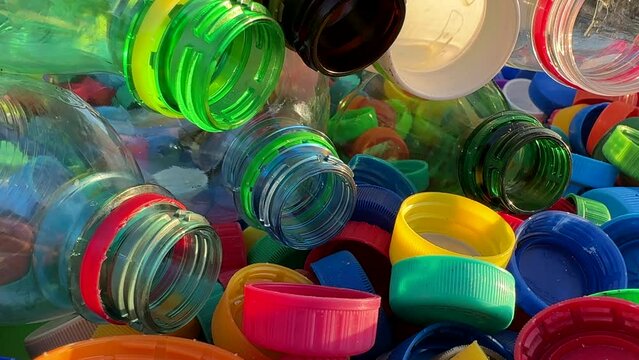 Plastic Recycling. Water bottles and plastic Bottle Caps for Recycling. Plastic recyclable and Reinventing. Bottle caps for Recycling. Lids from Plastic Bottles for Reuse. Plastics Reduce. Biopalstic