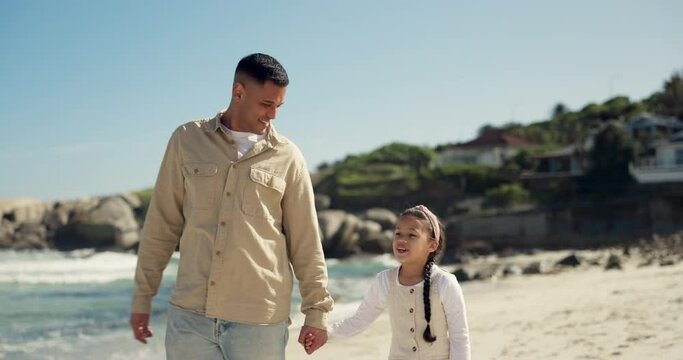 Beach, point and walking father and daughter holding hands, bonding and papa gesture at destination, holiday or view. Sea sand, happy family love and kid with dad care, support and travel on vacation