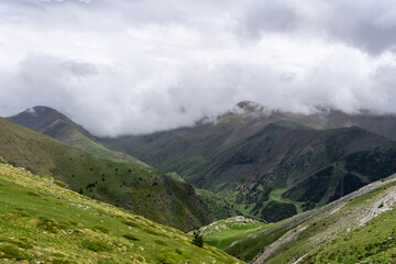 Wide green valley in the horizon in the Spanish Pyrenees