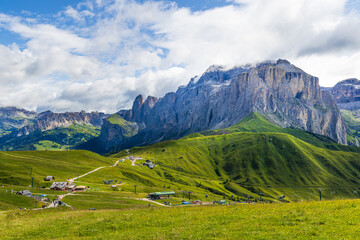 Fototapeta na wymiar A view of the Dolomites and the countryside into Val di Fassa