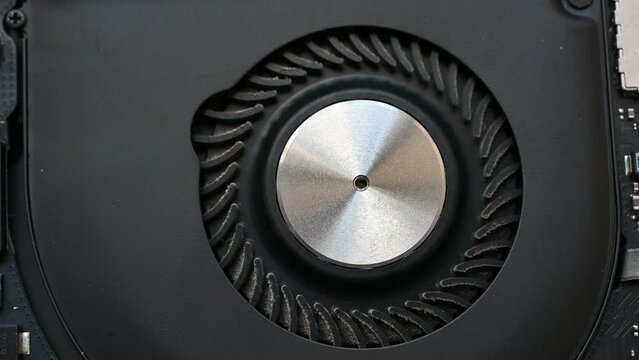 Dusty laptop cooler fan making noise