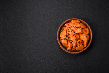 Delicious stewed sweet potato with salt, spices and herbs