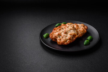 Delicious fried chicken chop or pork meat fried breaded with salt, spices and herbs