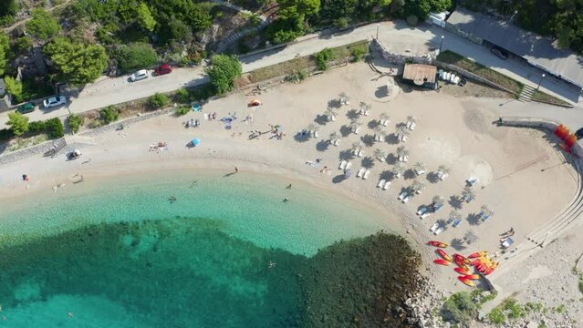 Dream bay beach Croatia morning light. vacation paradise few people at sunrise