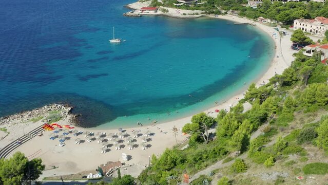 Vacation in Croatia. Beach and bay with clean water from above view.