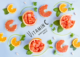 Collection of vitamin C sources. Fruits  enriched with ascorbic acid: orange, grapefruit, spinach,...