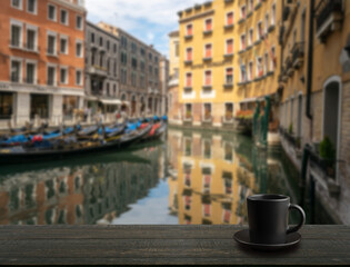 Fototapeta na wymiar Black Coffee Cup on Blurred Beautiful View Background