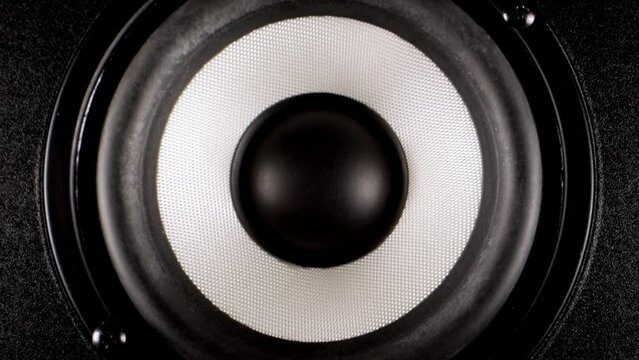 Audio Speaker Close up. Speakers making loud sound music. Close up of loud bass speaker vibration.