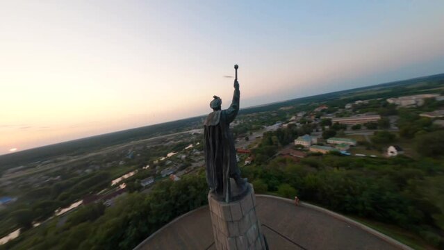FPV, Ukraine, Monument to the heroes of the liberation war 1648-1654 (part of monument to Bohdan Khmelnytsky) in Chyhyryn, Ukraine, aerial view, filming from a drone 