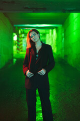 Girl in tunnel in red and green colours