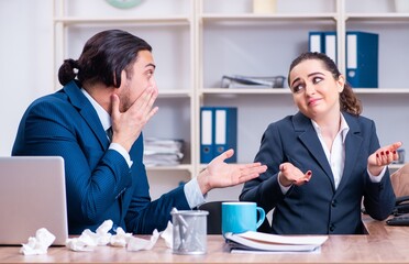 Two employees suffering at workplace