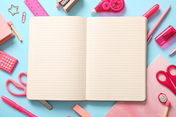 Composition with blank notebook and different school stationery on blue background, closeup