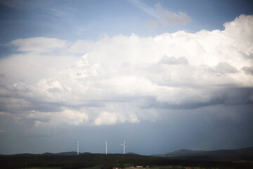 Obraz premium Hydraulics in the middle of the mountain, with a cloudy sky. Renewable energy. Who knows will be saving the planet