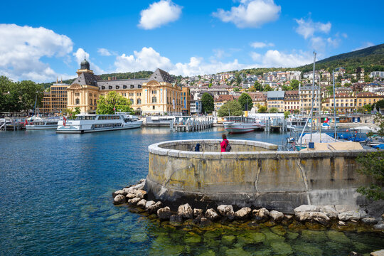 Fototapeta Neuchatel, Switzerland - August 7, 2023: Neuchâtel, the French-speaking capital of the Swiss canton of the same name, lies on the northern shore of Lake Neuchatel.