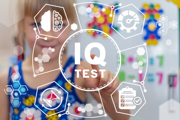 Little girl using virtual touch interface presses inscription: IQ TEST. Concept of IQ EQ Test School Preschool Kids Level Education. IQ Intelligence Quotient Concept. - obrazy, fototapety, plakaty