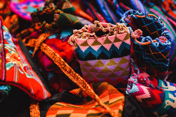 Close up shot of Guatemalan handcraft textile and colorful patterns made by indigenous woman