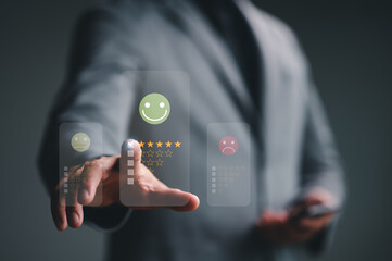 Businessmen choosing on the happy Smile face icon to give satisfaction in service, Customer service and Satisfaction concept, rating very impressed. review, feedback, best quality, good mood.