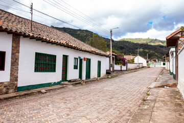 Fototapeta na wymiar Beautiful architecture of the streets of the colonial small town of Iza located in the Boyaca department in Colombia