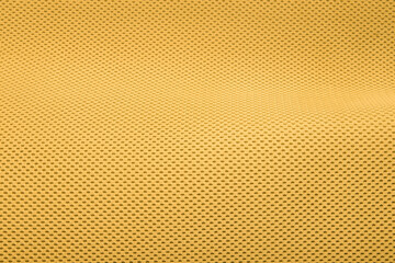 Rough yellow fabric texture, cotton knitted fabric, modern waterproof flexible temperature control materials, multifunctional smart textile close-up, selective focus, does not tear