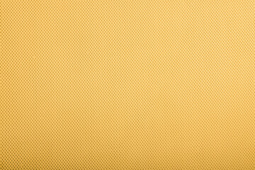 Rough yellow fabric texture, cotton knitted fabric, modern waterproof flexible temperature control materials, multifunctional smart textile close-up, selective focus, does not tear