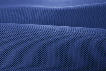 Rough navy blue fabric texture, cotton knitted fabric, modern waterproof flexible temperature control materials, multifunctional smart textile close-up, selective focus, does not tear