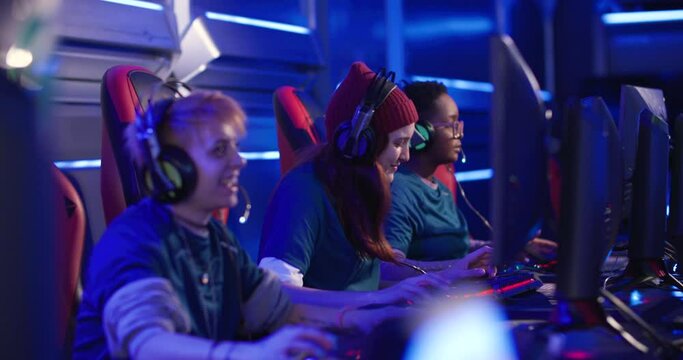 Young female Esports team getting ready to compete in a tournament at an esports venue