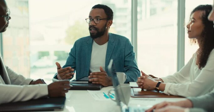 Business people, black man and meeting with leader, feedback and conversation with review. African person, manager and employees with discussion, ideas or teamwork with cooperation or brainstorming