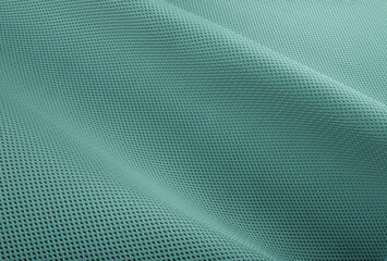 Rough pool green fabric texture, cotton knitted fabric, modern waterproof flexible temperature control materials, multifunctional smart textile close-up, selective focus, does not tear