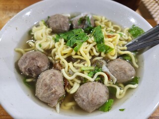 Indonesian food : Bakso (meatball)  Meatballs are made from crushed beef and mixed with flour. eaten with a mixture of noodles and broth
