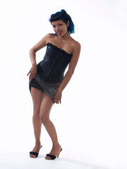 Naklejka premium Slim Attractive Hispanic Woman Standing In Black Corset