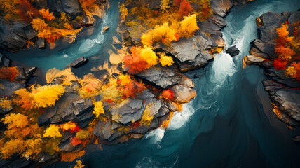 The natural beauty of autumn: a river flows through the mountain landscape.