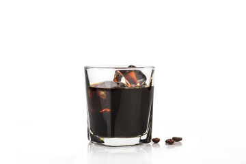 Americano ice coffee and coffee beans spread on  white backgroun